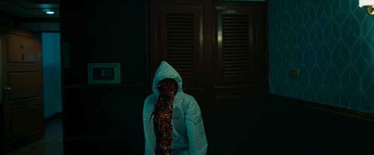 A parasitic monster reaching out from its host