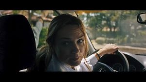 The main character in a car.