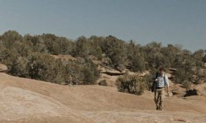 A man walks towards the camera
